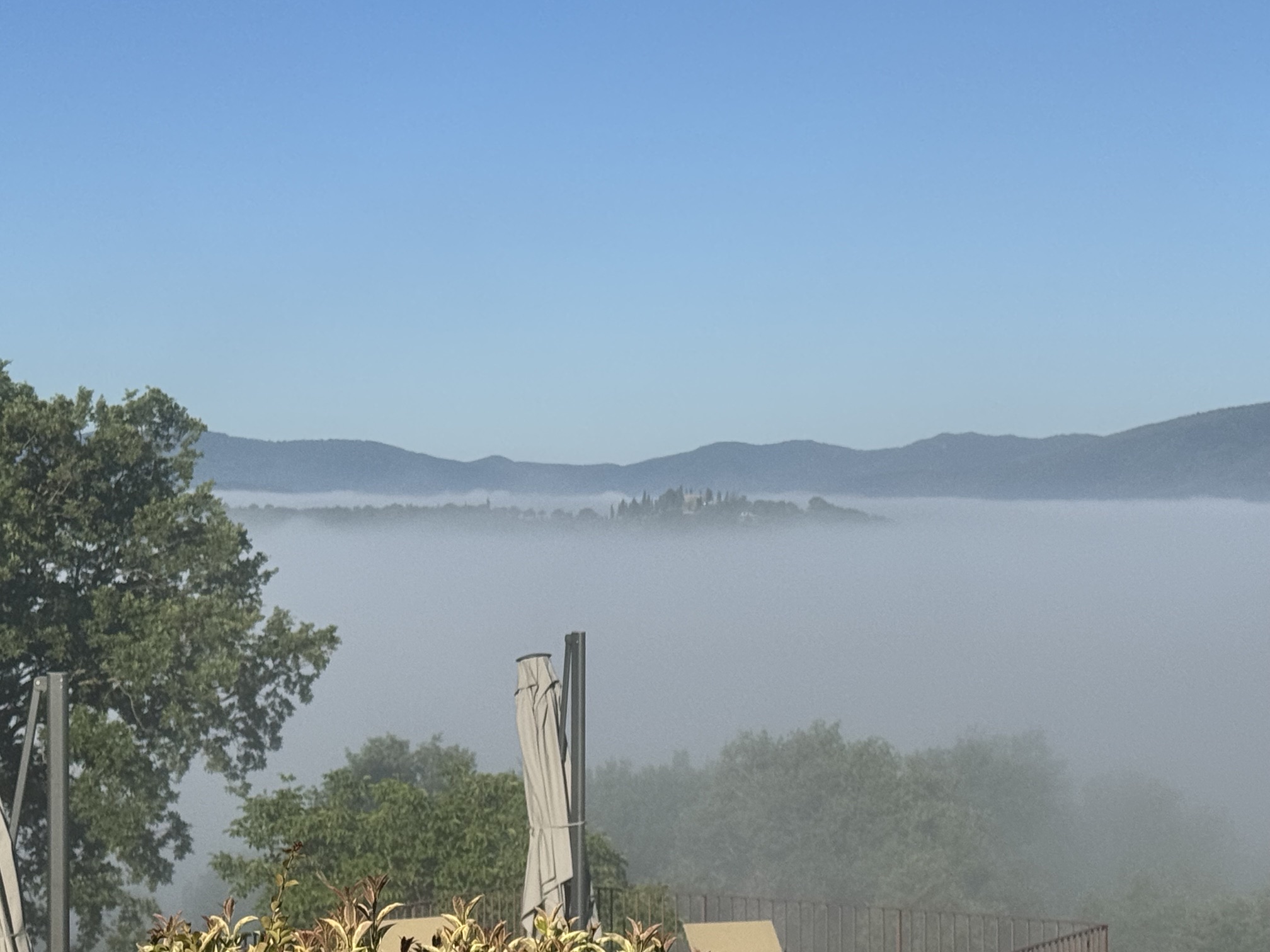 Casa Luna above the morning clouds in the Niccone Valley