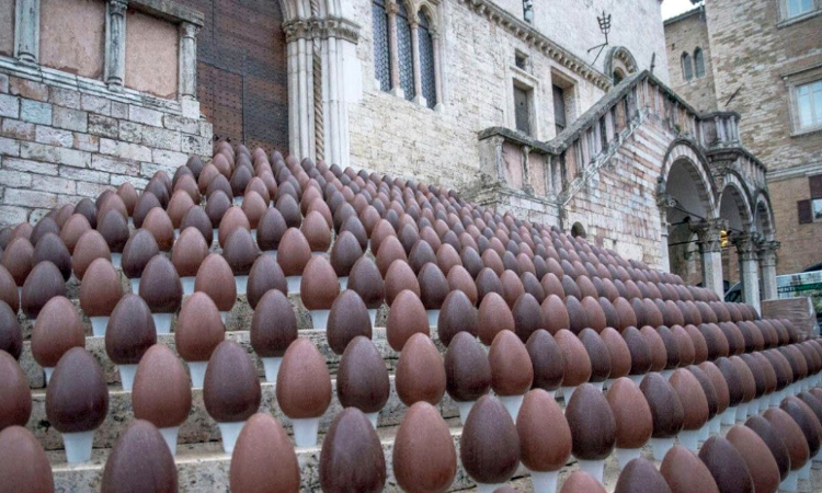 Rows of chocolate eggs displayed on the steps of Perugia's cathedral during EuroChocolate festival